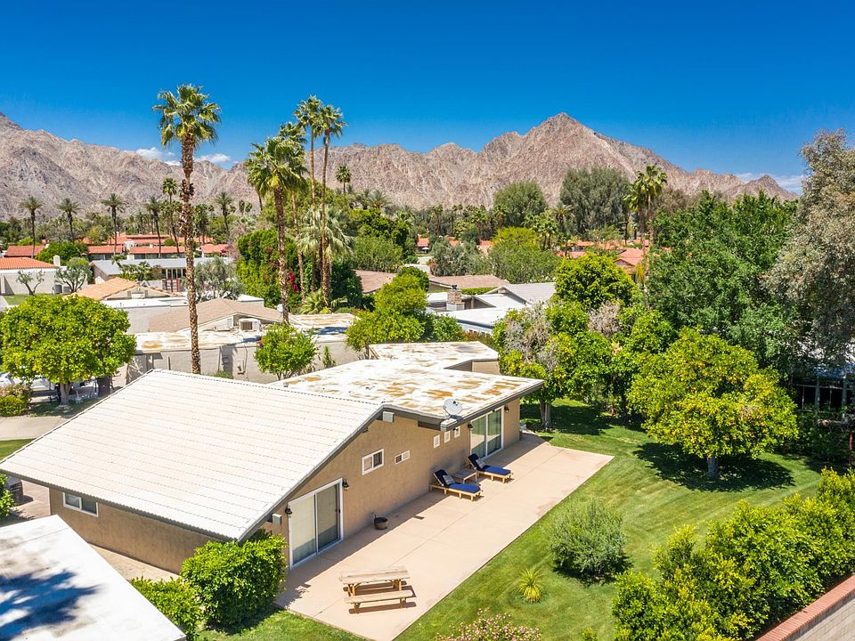 Skyview of house and backyard