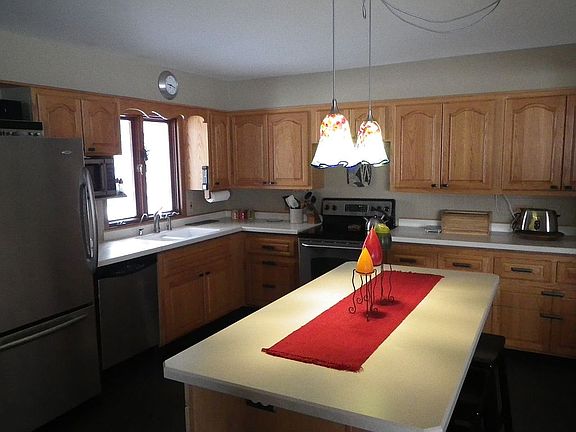 kitchen opens to DR & LR