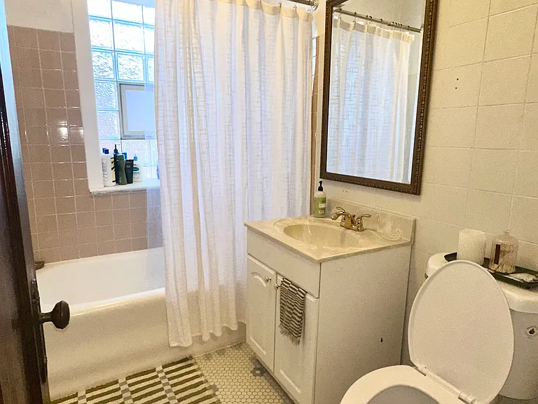 bathroom w/ brand new toilet