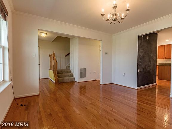 Dining with hardwood floor