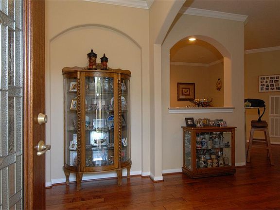 Here is the entry view with a wall upon which you can place a nice piece of furniture as shown.