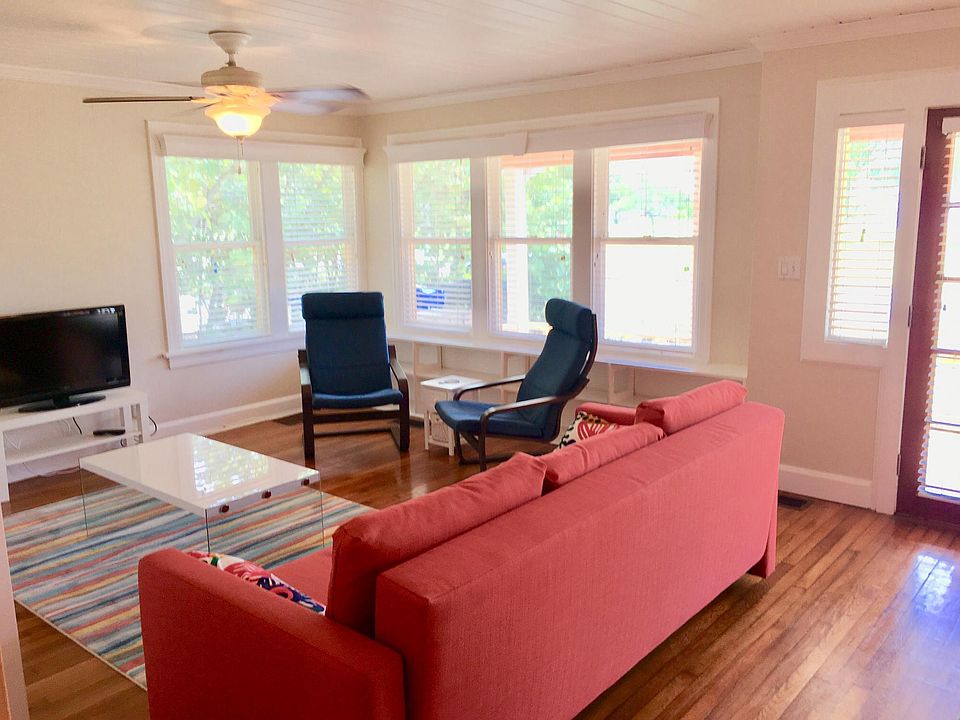 Living room with windows to Tampa Bay