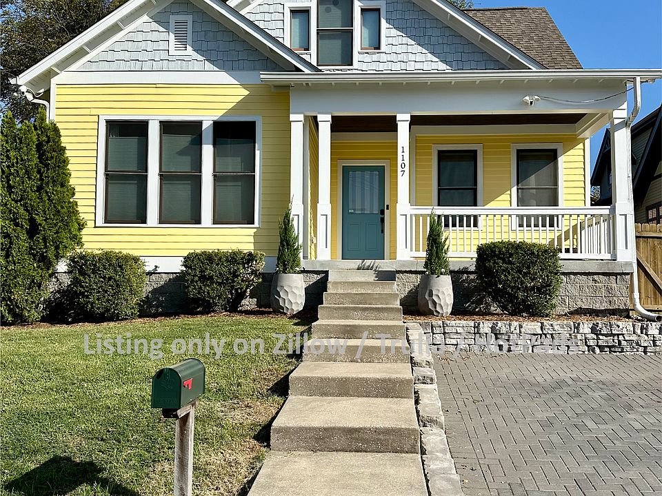 Front curb appeal with covered front porch.