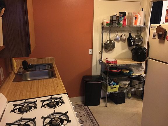 Kitchen view after passing the bathroom.