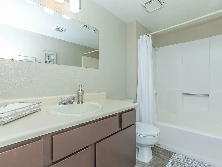 Modern Bathrooms with Stylish Features at Wind Tree Apartments in El Paso, TX