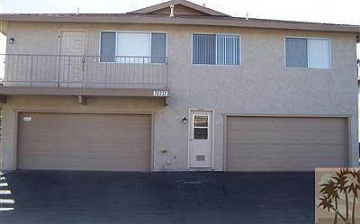 back of unit w/ garage