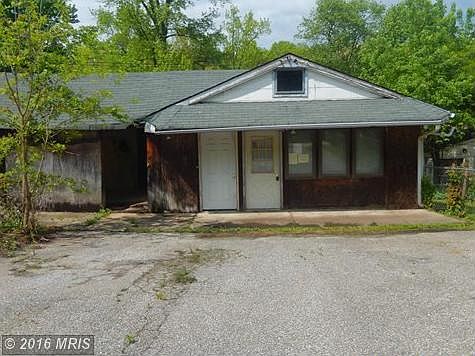 Storage Building Off Driveway