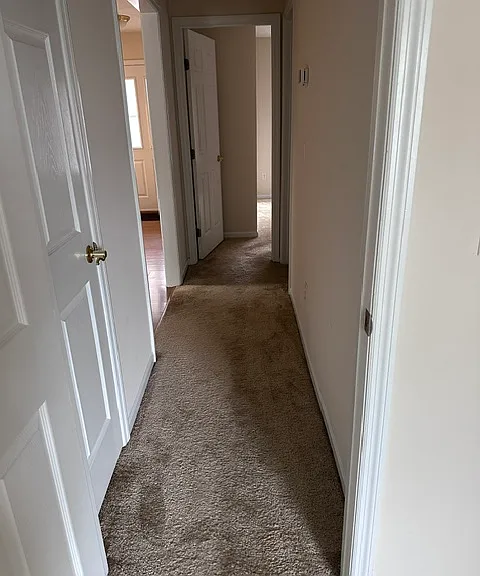 Hallway from one bedroom to another