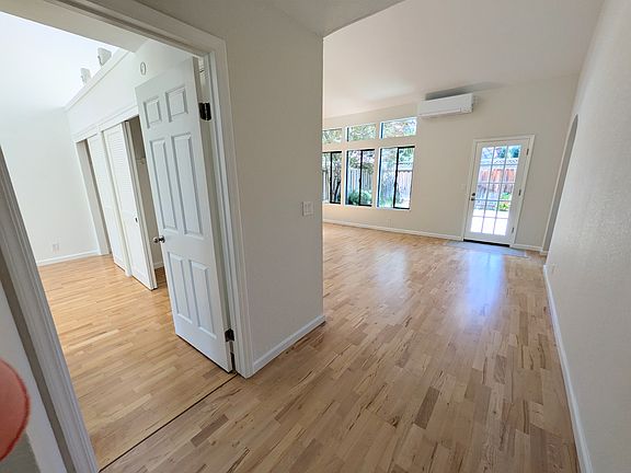 View of living room and the first floor bedroom.
