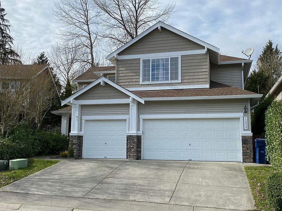 3 car garage and ample parking