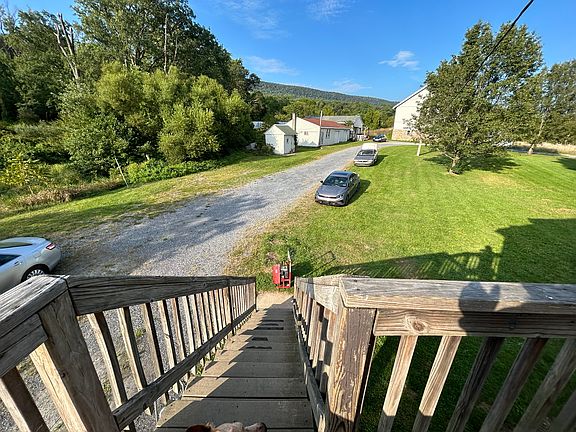 Steps leading to where tenants park.