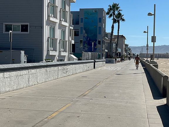 Enjoy a stroll or ride your bike on Hermosa Beach's strand.