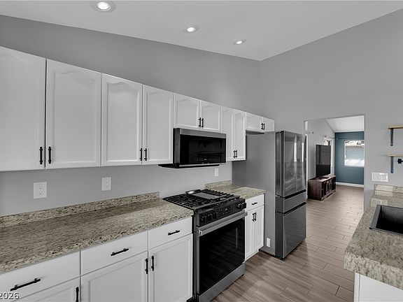 4th image of 7729 White Grass Ave