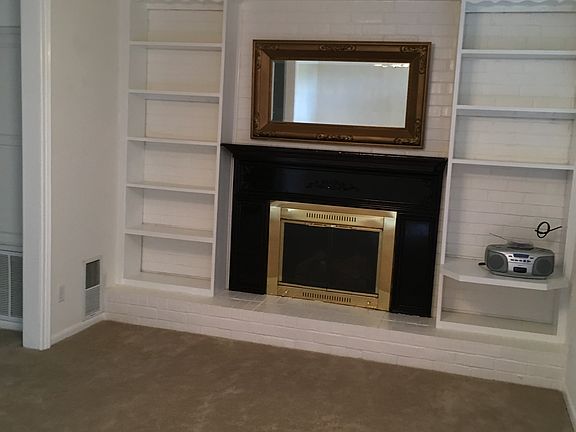 gas fireplace/bookshelves