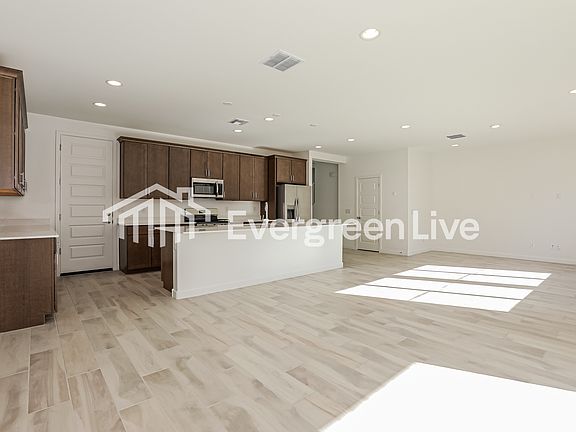 4th image of 10135 E Ulysses Ave