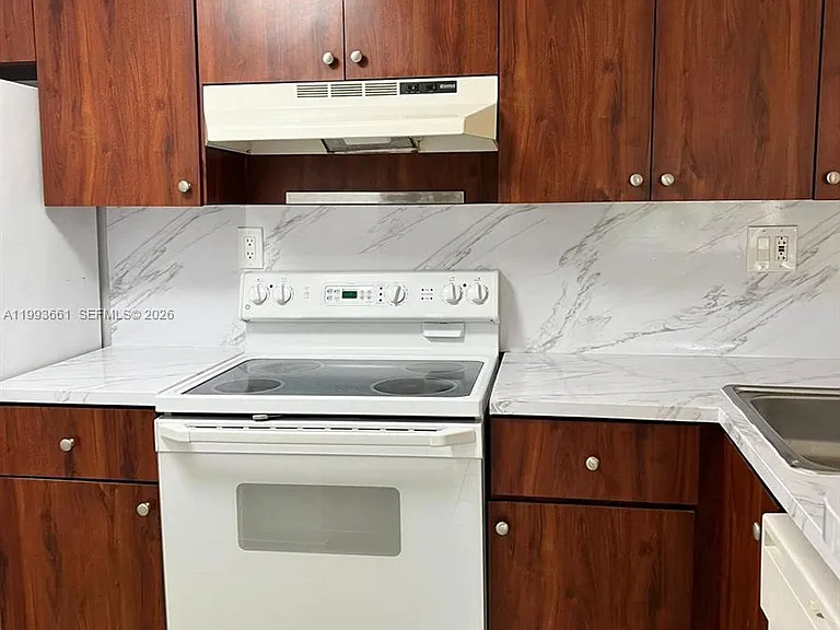 7595 NW 179th St #119 — Photo 14