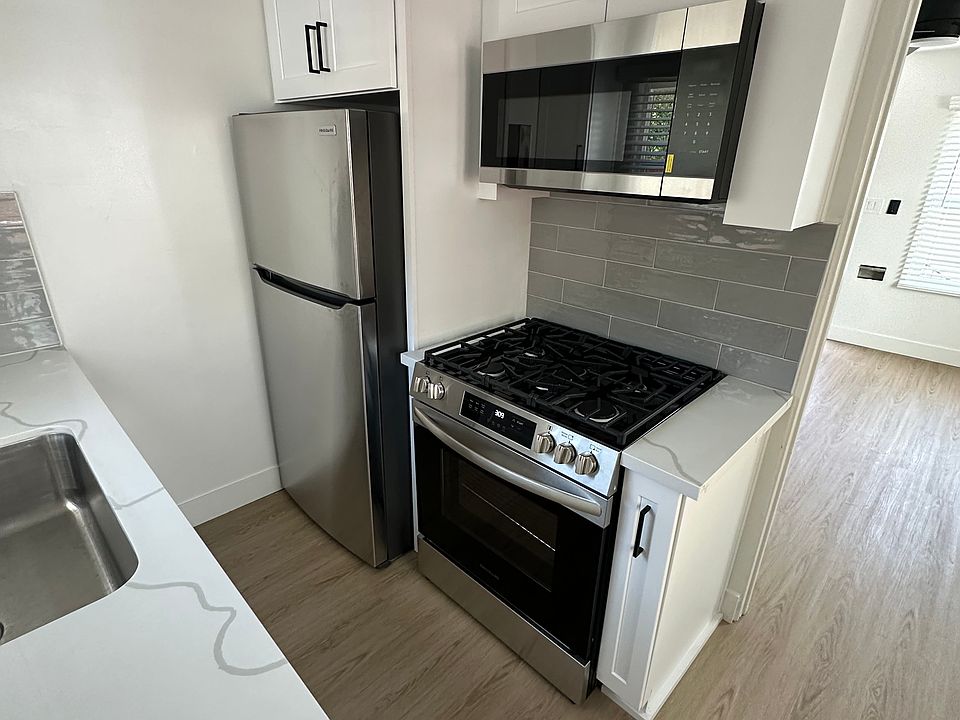 Stainless Gas Stove, Microwave and Fridge