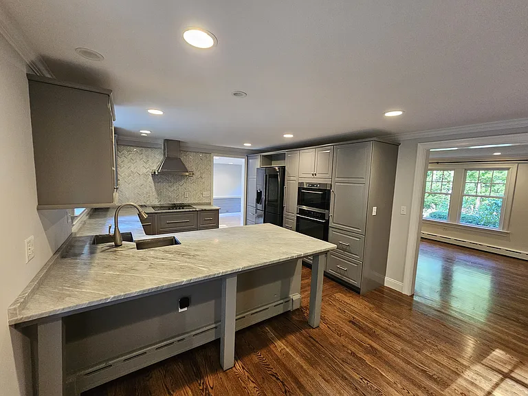 Kitchen _ View 2
Additional view highlighting the central island, generous countertop space and recessed lighting