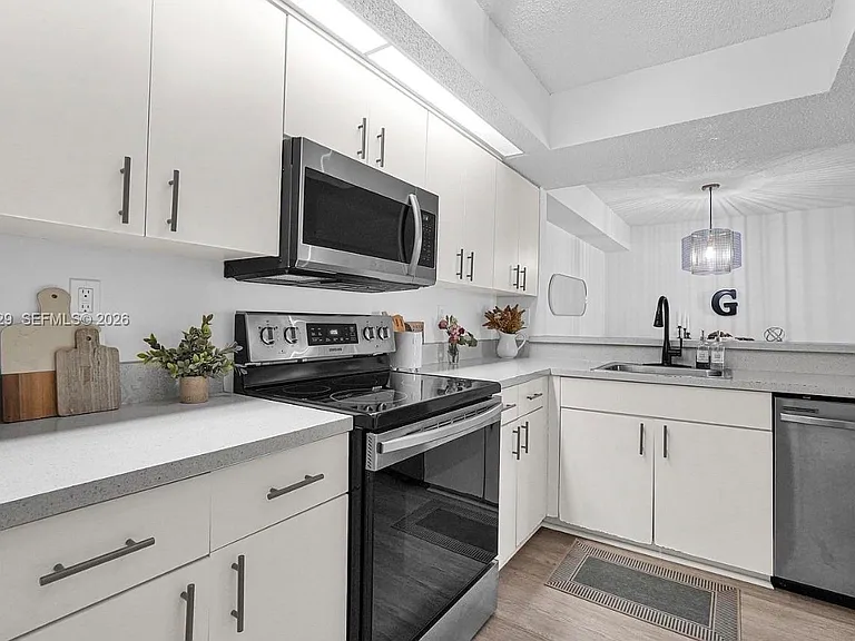 8680 SW 212th St #105 — Photo 12