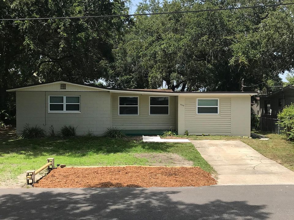 Front view of house with 2 parking spaces there. There is additional parking across the street too.