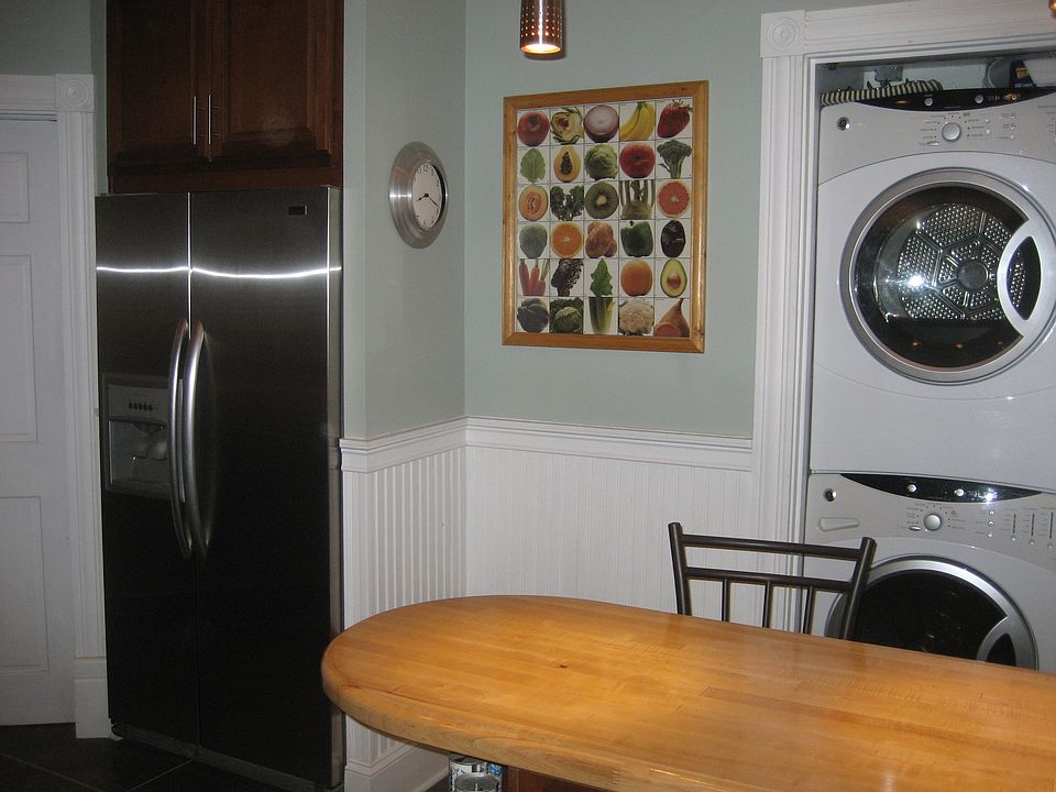 Kitchen 3 refrigerator and in-unit laundry