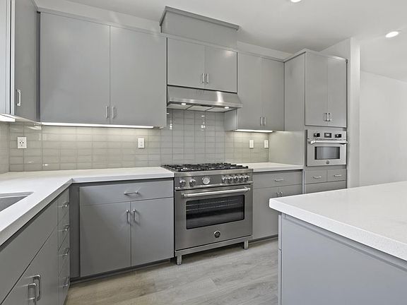 Kitchen stove, hood, oven/microwave
