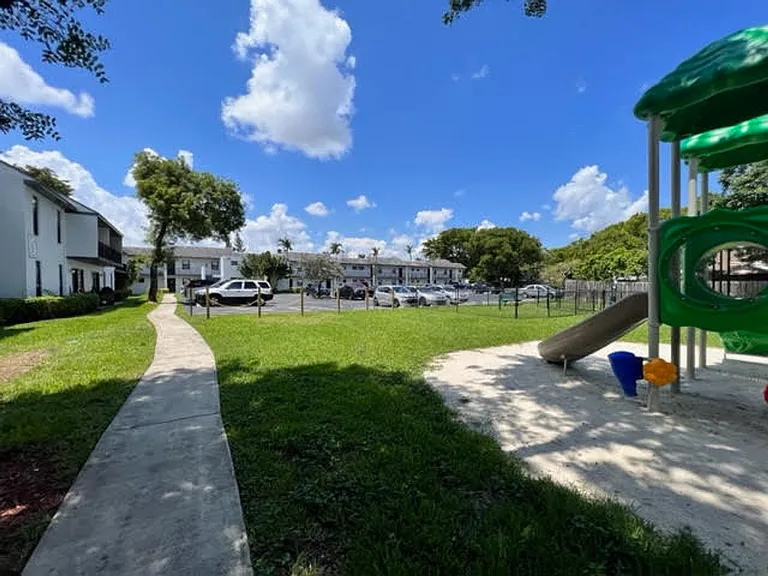 Colonial Village - 7550 Stirling Rd — Photo 43