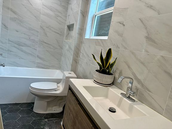 Freshly renovated - modern designer bathroom.