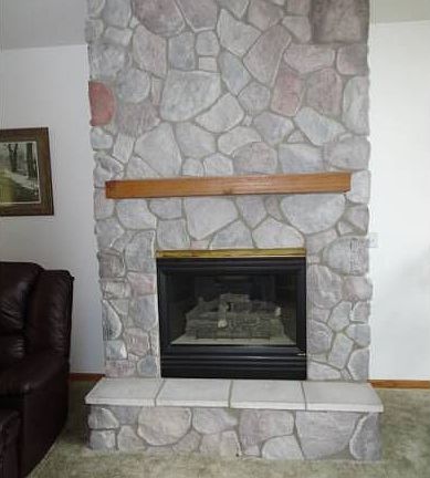Stone gas fireplace