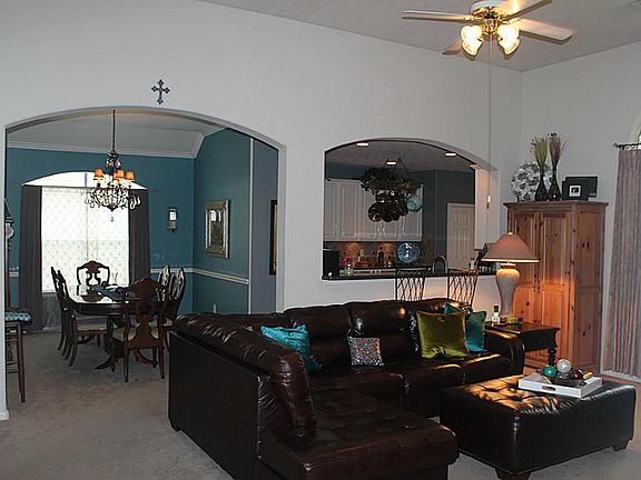 Open floorplan from family room, formal dining and kitchen.