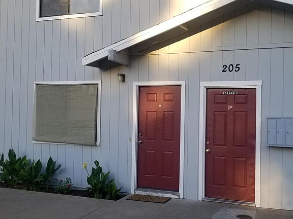 Entrance to stairway next to mailboxes