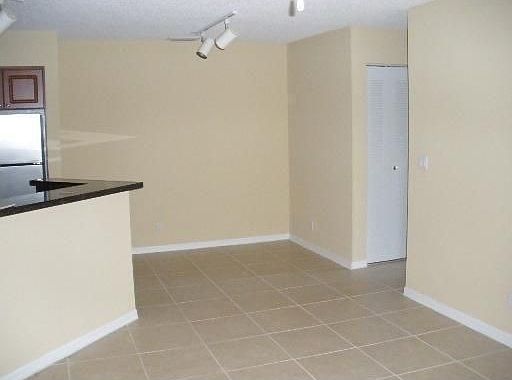 2nd image of 3470 Pinewalk Dr N APT 212