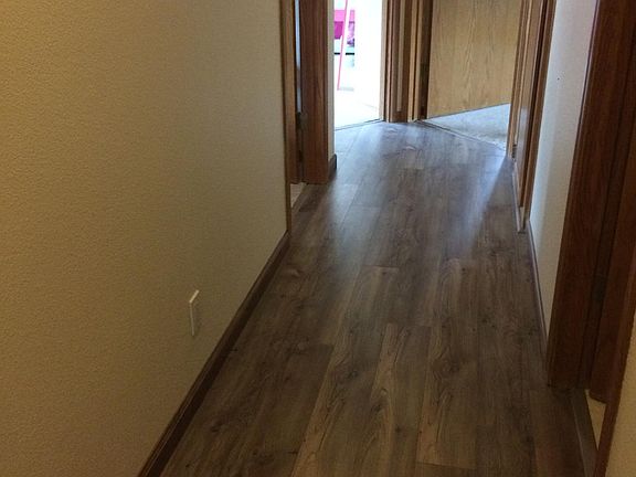 Hallway. First door to right is guest bath, 2 doors on left guest bedrooms, and master in right.