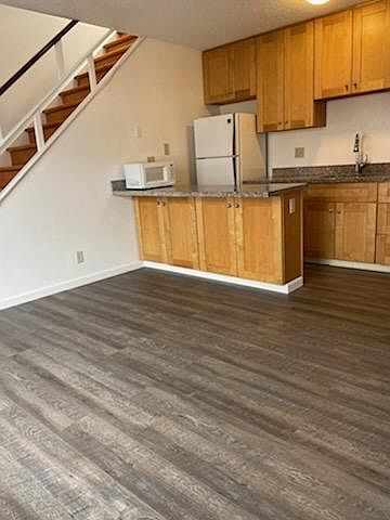 living room area facing kitchen