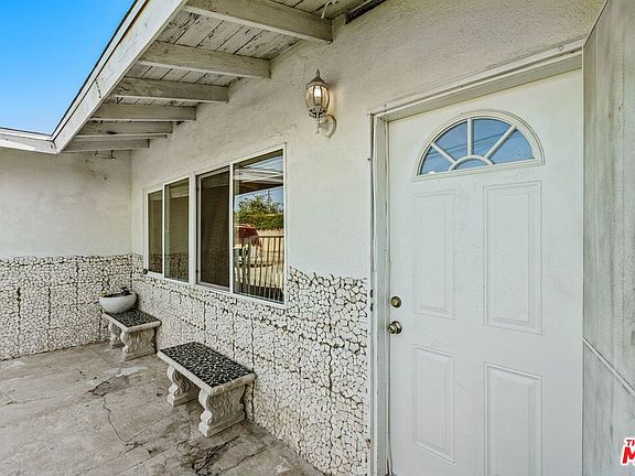 4th image of 9732 E Camino Real Ave