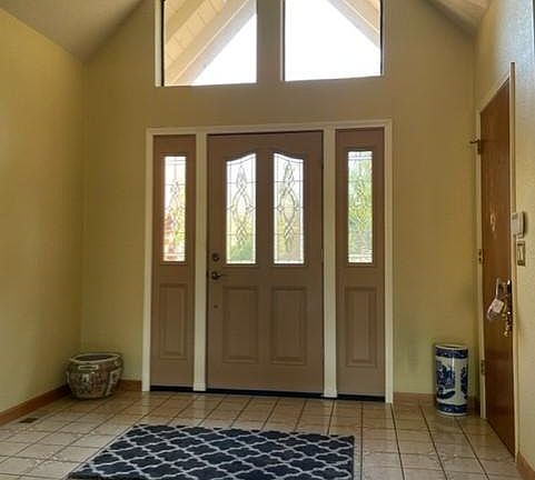 Spacious, bright entry with coat closet.