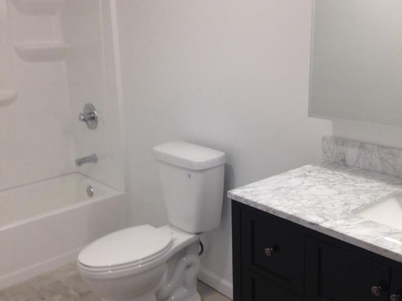 Completely renovated 1st floor bathroom. Espresso cabinetry 