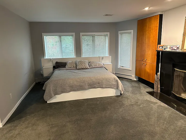Primary w/en suite bath and fireplace. Main floor. Direct NYC skyline and ocean views.