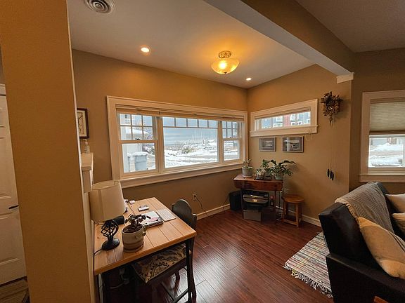 The Front Room has a direct view of Lake Michigan and can be used in many ways, including as a dining or office area. (2 of 2 views.)