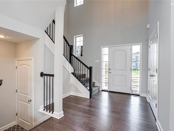 Large welcoming entry just steps to lower level door