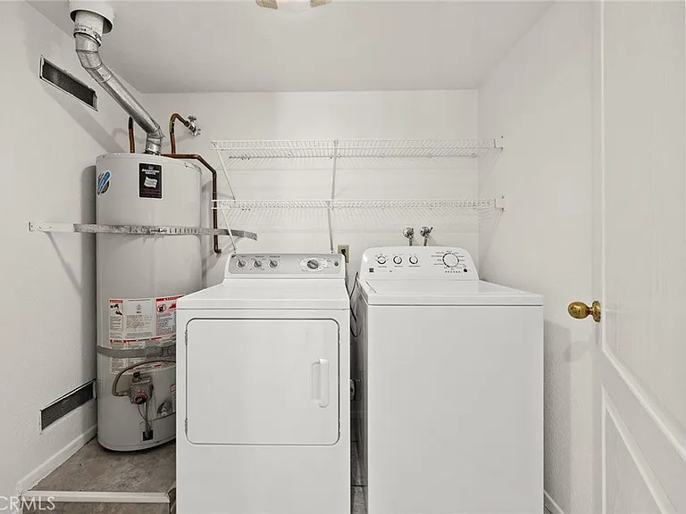 Spacious downstairs laundry room with new water heater; washer & dryer optional.