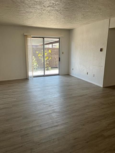 Living room with private outdoor patio