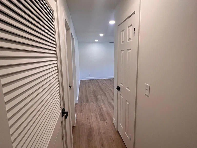 Hallway to 2 bedrooms