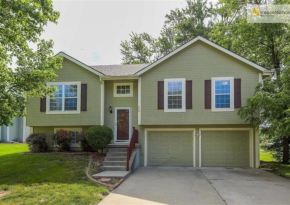 Charming home surrounded with mature trees.