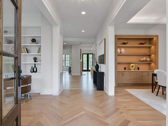 Herringbone entry opens to the whole floor