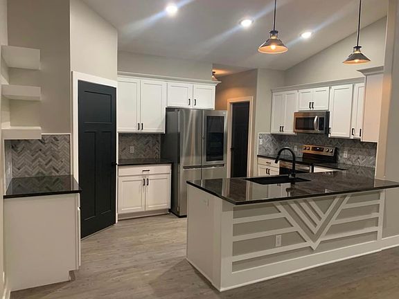 Kitchen with all appliances. Coffee bar and large pantry.