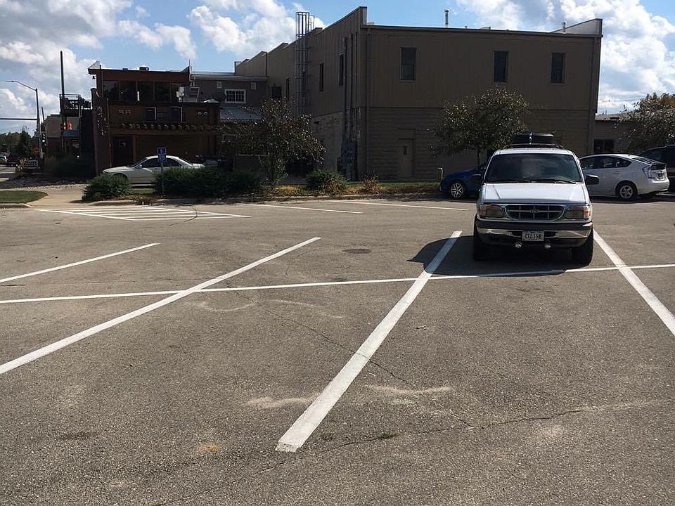 View of the back of the building and 24 hour parking lot.