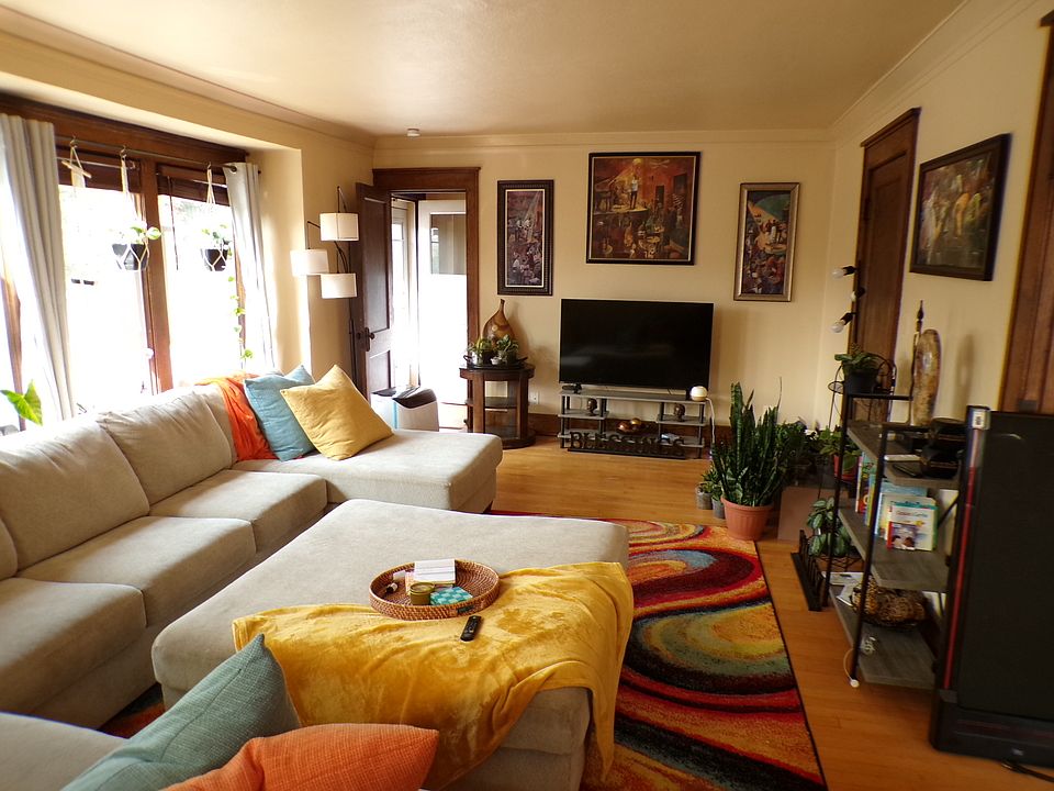 Large living room with maple floors