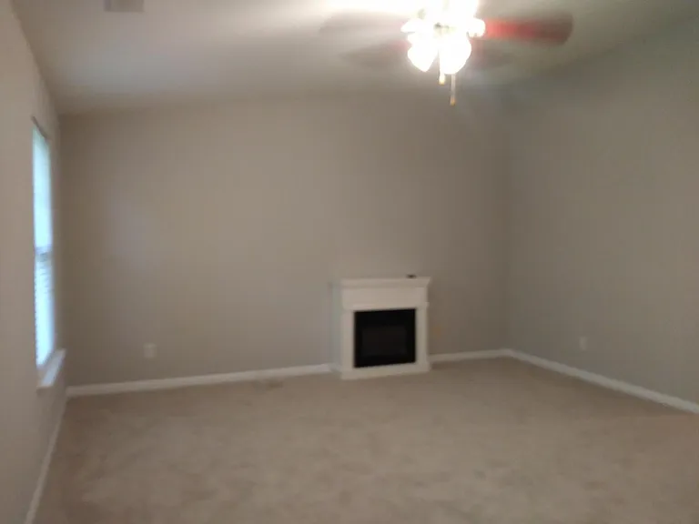 Master Bedroom with Vaulted Ceiling and walk in closet.