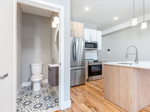 1/2 bathroom off of kitchen/ living /dining area